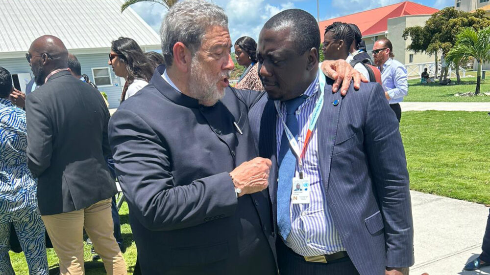 AISDEBF Delegate Tabenyang talking energy and climate politics with Prime Minister Ralph Gonsalves of St Vincent & the Grenadines